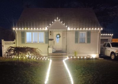 christmas lights on a residential home put on by DJ Power washing,