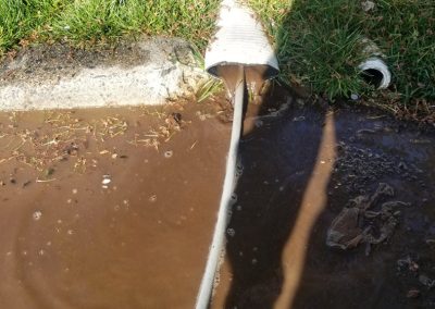 blocked storm drain on residential property, from our gallery